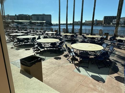 Tables on the Tampa Riverwalk outside Tampa Convention Center