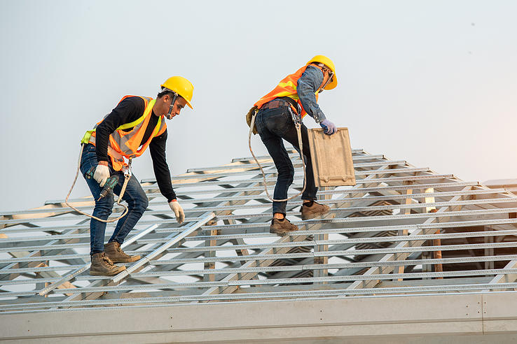 Construction workers on roof