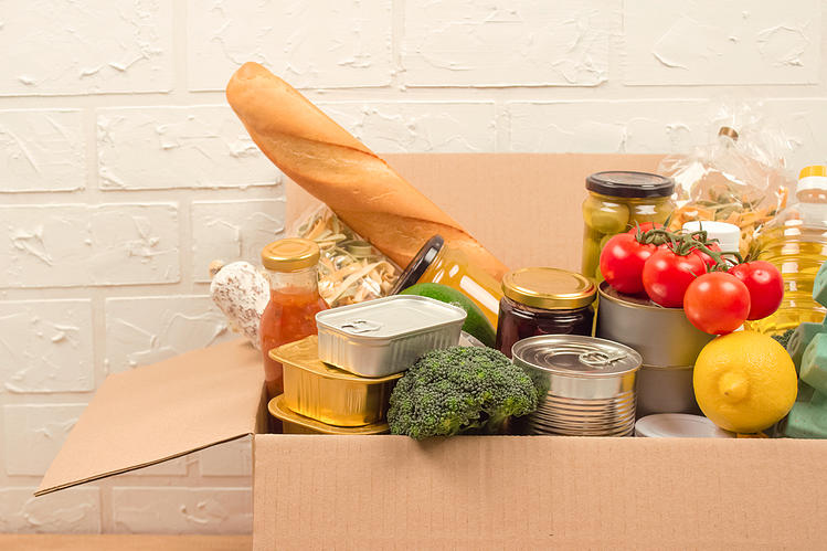 Cardboard box with donated food