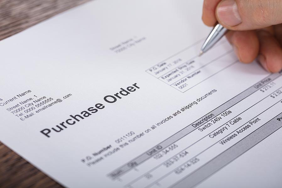 Person signing purchase order