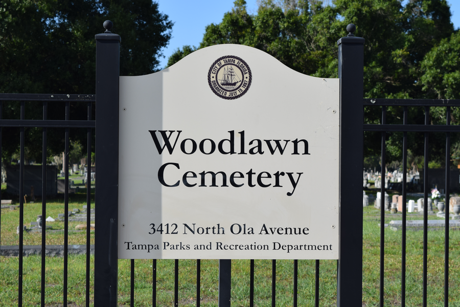 Woodlawn Cemetery entrance sign with address in Tampa.
