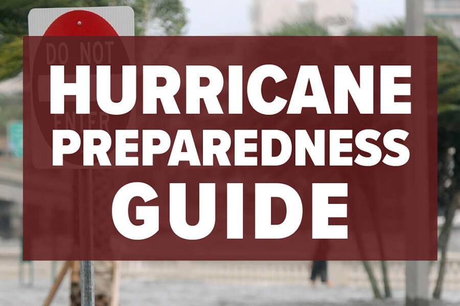 Hurricane Preparedness Guide 2026 graphic with flooded street and strong winds in background.