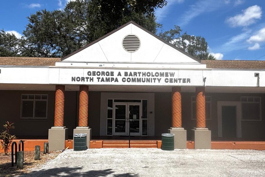 Front entrance of the George Bartholomew North Tampa Community Center on a sunny day.