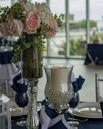 Wedding décor displayed on a table at the River Center