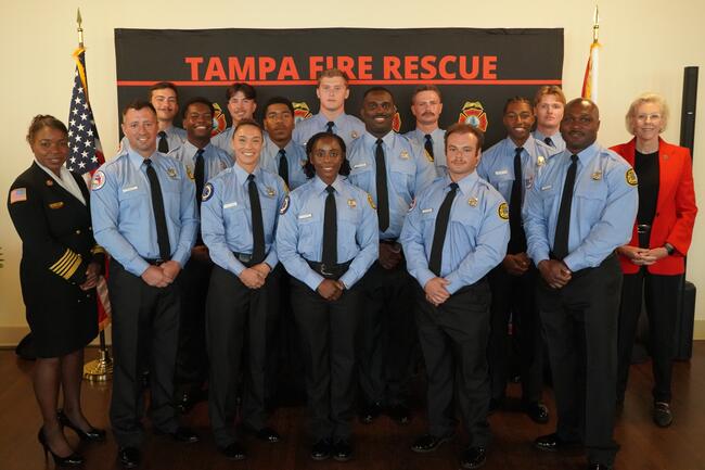 Group photo of Tampa Fire Rescue team in uniform.