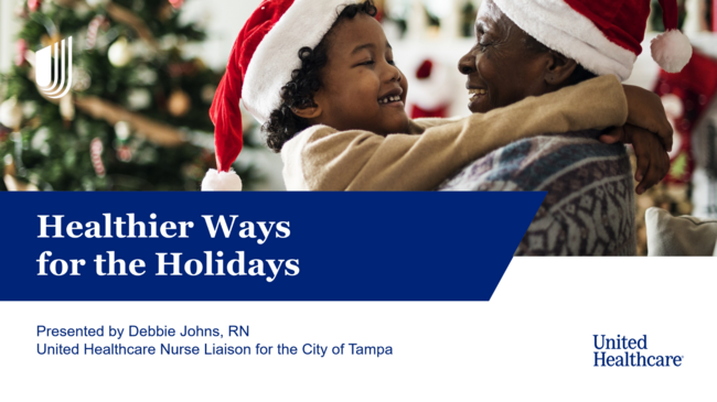 Healthier holiday tips; child and adult wearing Santa hats by a Christmas tree.