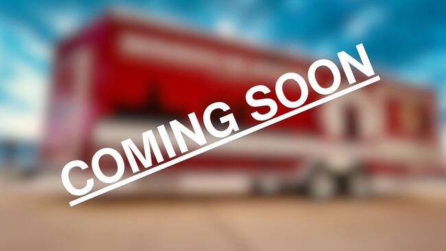 Blurred trailer preview with "COMING SOON" text across the image.