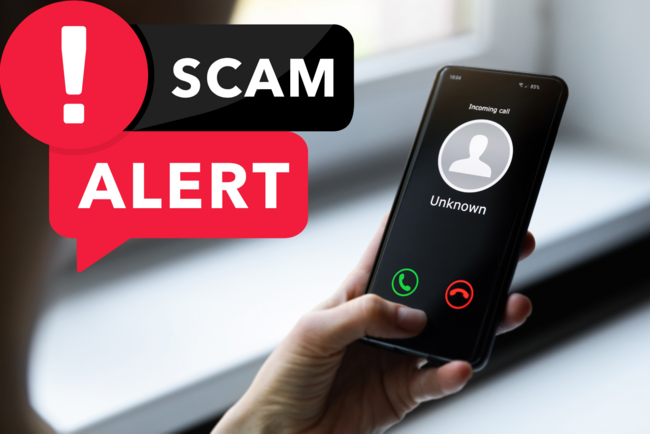 Graphic of a phone showing an unknown caller with a red “Scam Alert” warning.
