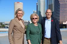 Mayor Jane Castor stands with USF Interim President Rhea Law and Tampa Electric President and Chief Executive Officer Archie Collins.