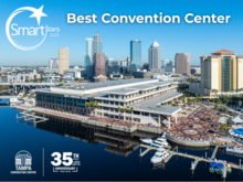 Aerial photo of Tampa Convention Center on a waterfront with text that reads Smart Stars 2025 Best Convention Center