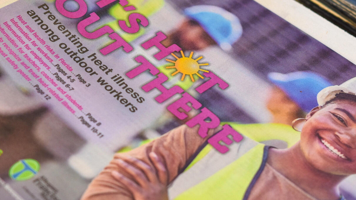 Graphic showing outdoor workers in safety vests with text: "It's Hot Out There. Preventing heat illness."