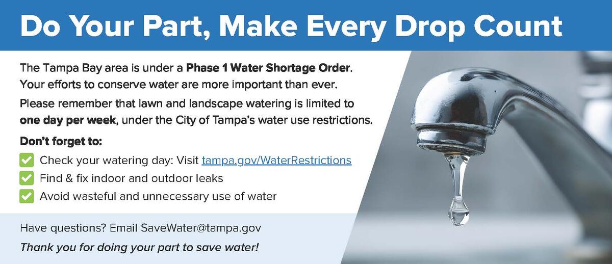 Sign urging customers to follow Tampa's outdoor watering rules. 